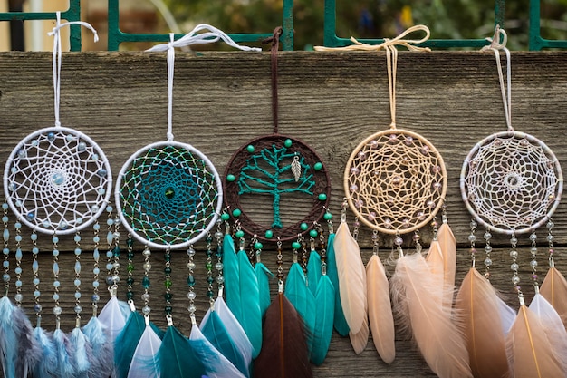 Handmade dream catcher with feathers threads and beads rope hanging