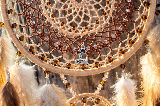 Handmade dream catcher with feathers threads and beads rope hanging