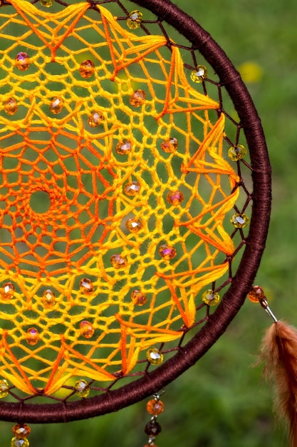 Handmade dream catcher with feathers threads and beads rope hanging