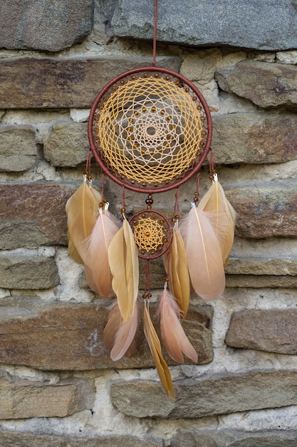 Handmade dream catcher with feathers threads and beads rope hanging