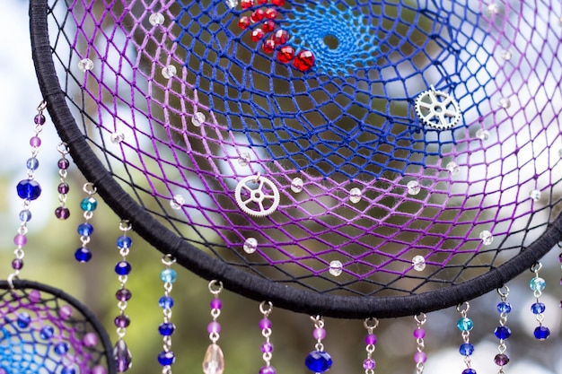 Handmade dream catcher with feathers threads and beads rope hanging