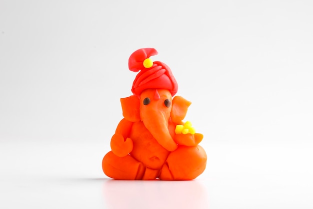 Handmade Lord ganesha sculpture on white background