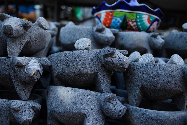 Handmade stone molcajete in the shape of a pig Prehispanic kitchen utensil