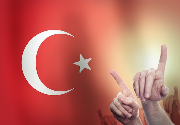 Hands on the background of the Turkey flag Freedom concept