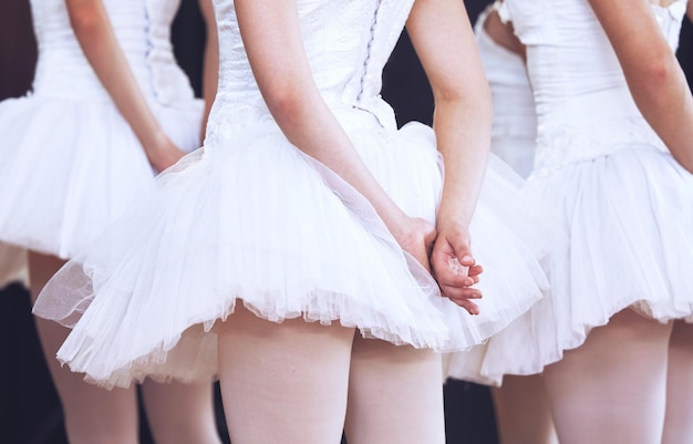 Hands of ballet women at dance performance ready for abstract dancing show creative recital or showcase back view dancer collaboration teamwork and prima ballerina team on stage waiting to start