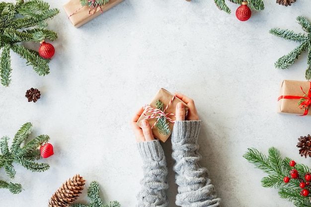 Hands holding a Christmas present