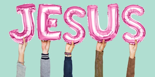 Hands holding Jesus word in balloon letters