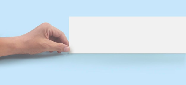 Hands holding paper blank for letter paper