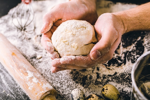 Hands kneading a dough