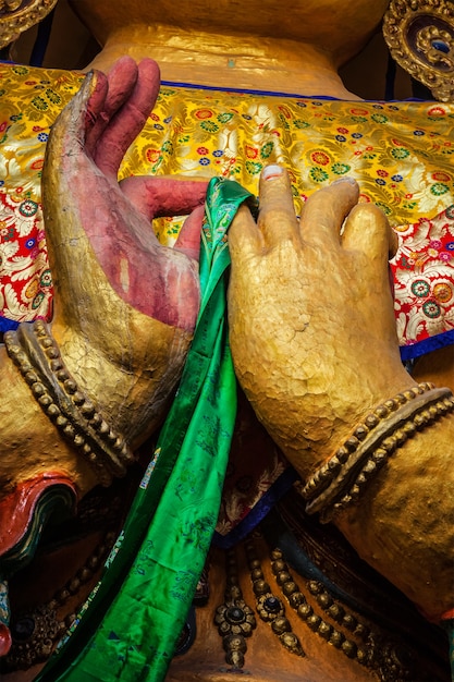 Hands of maitreya buddha close up