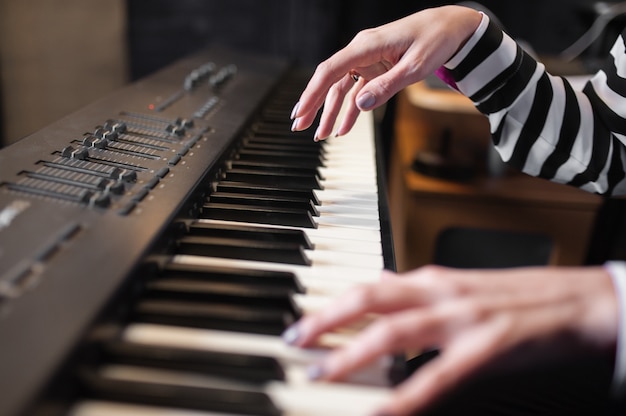 Hands music, synthesizer, piano