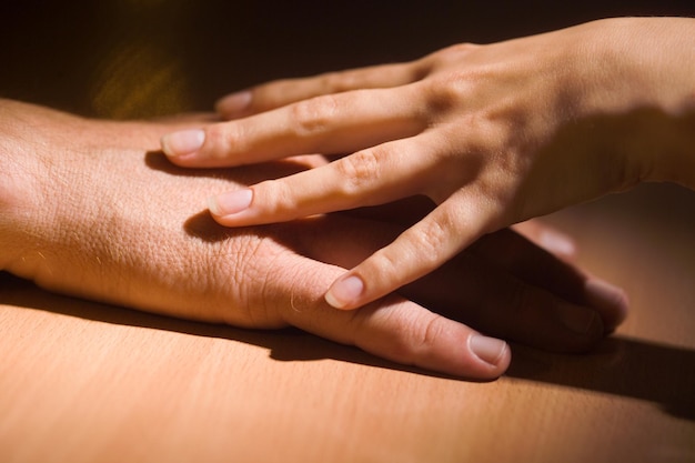 hands of the people photographed in different ways in the studio