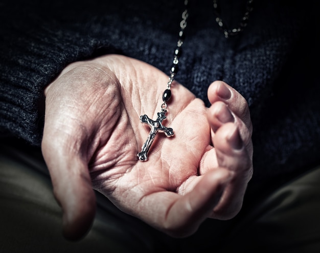 Hands and rosary