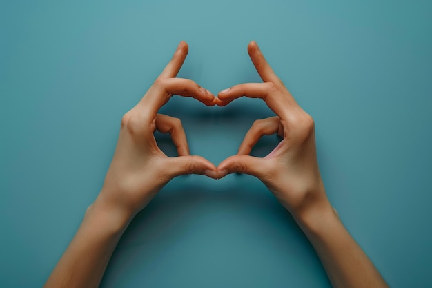 Photo hands in the shape of a heart with their hands