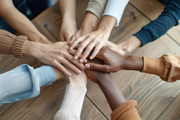 Hands Together Symbolizing Unity and Support in Teamwork