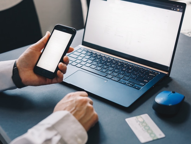 hands using a smartphone for online shopping