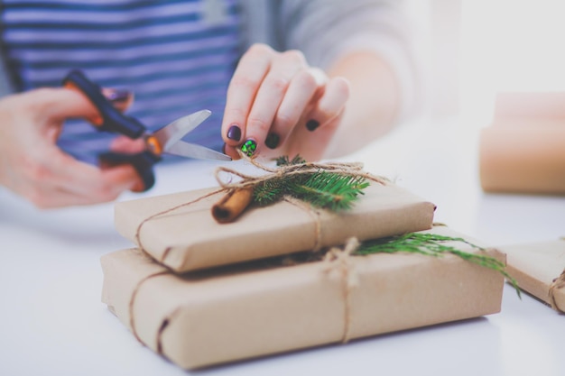 Hands of woman holding christmas gift box