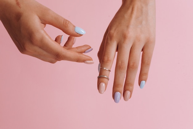 Hands of young woman with beautiful manicure