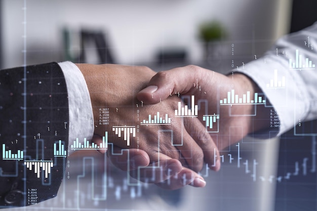 A handshake as a symbol of successful transaction on brokerage services at international investment bank Capital market stock trading Financial hologram chart Women in business