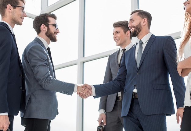 Handshake business people in the officeconcept of cooperation