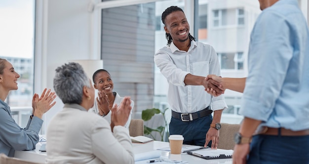 Handshake meeting and business people in office for teamwork collaboration and partnership Corporate office professional and happy workers shaking hands for agreement b2b deal and thank you