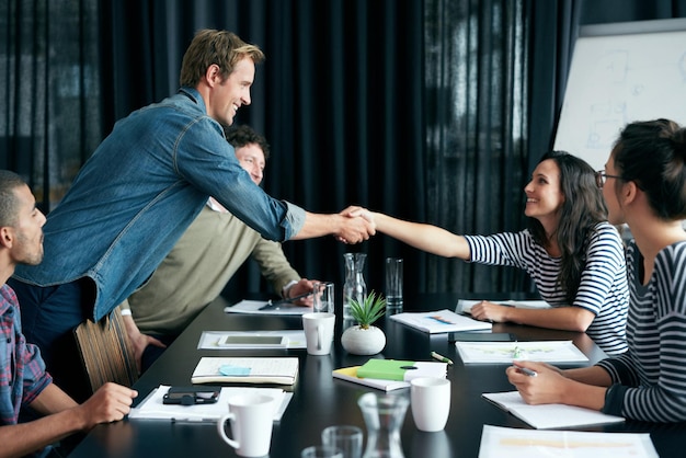 Photo handshake people and deal in office meeting with partnership for contract or business success shaking hands trust and consultant for onboarding in workplace boardroom by collaboration or diversity