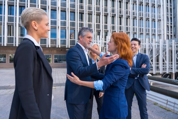 Photo handshake between professionals in a business district