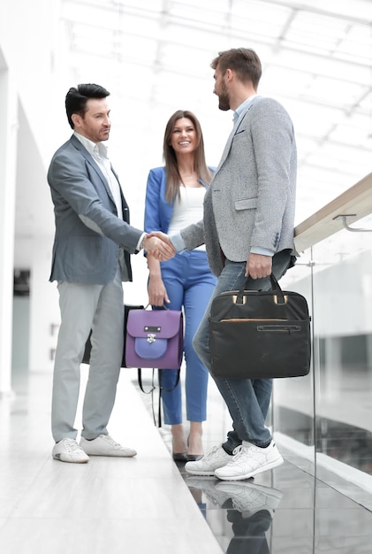 Handshake of the staff of the business centre