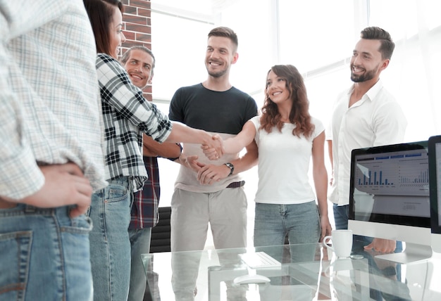 Handshake of young people