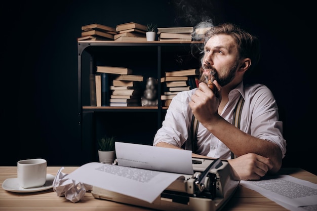 Handsome Bearded Writer Thinking and Smoking Pipe