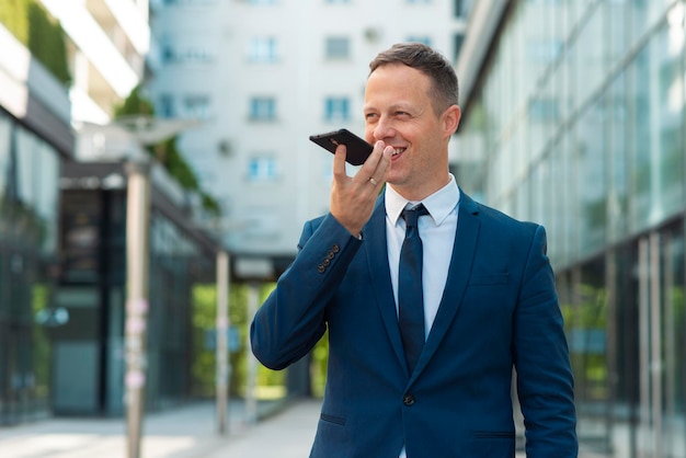 Handsome business man talking on phone