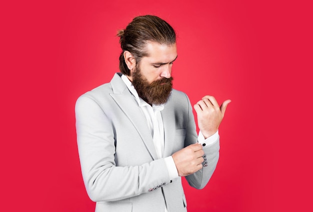 Handsome caucasian businessman with trendy hairstyle in jacket barber