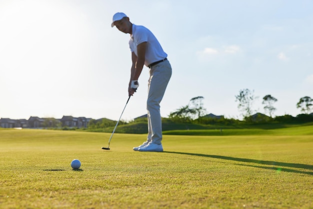 Handsome confident male golfer