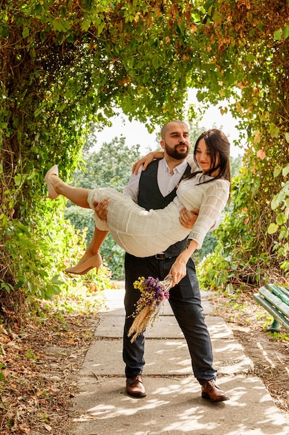 Handsome couple girl and guy in the park