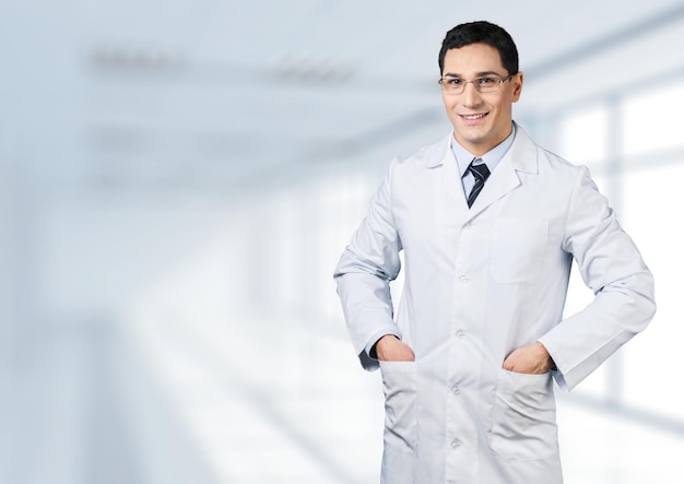 Handsome doctor portrait  on background