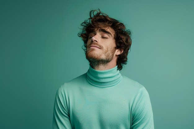 Photo handsome fashion model in basic turtleneck male dress with mint green lifestyle mens portrait background