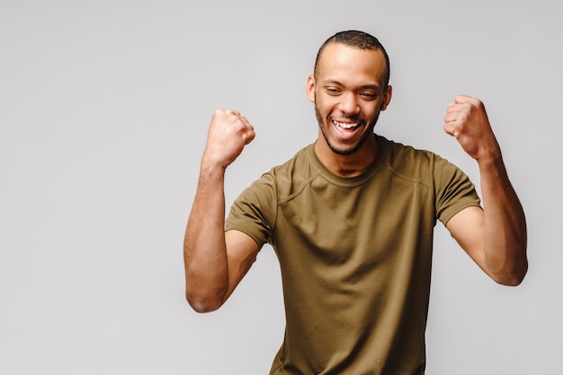 Handsome guy over light gray background