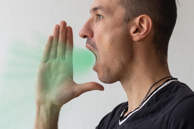 Photo handsome happy man wearing t-shirt, guy speaking loudly, isolated on white background.