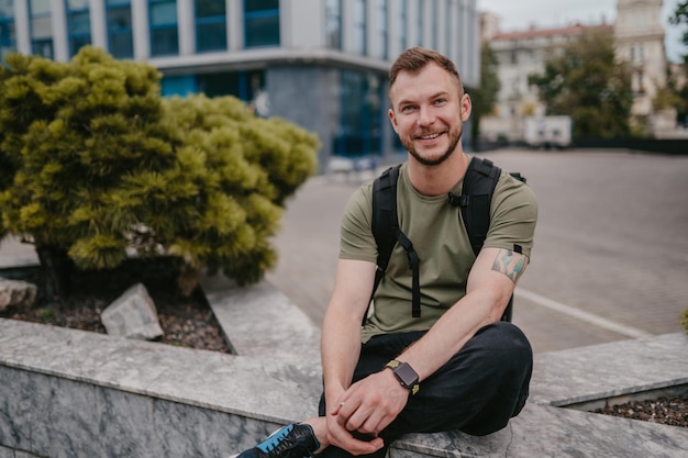 Handsome hipster man walking in street