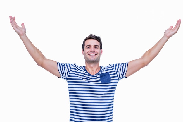 Photo handsome hipster smiling at camera with arms outstretched