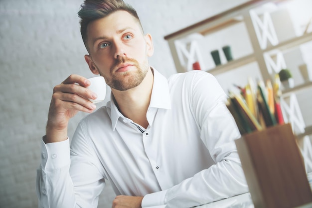 Handsome male with coffee cup