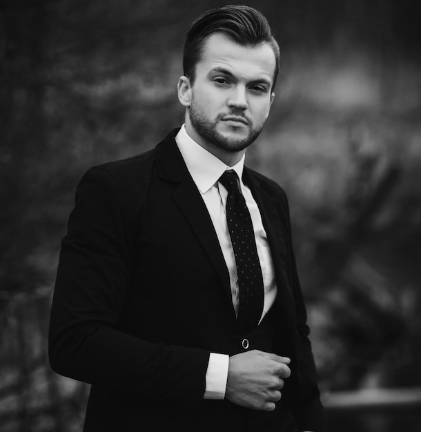 Handsome man in black suit