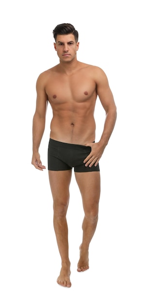 Handsome man in black underwear on white background