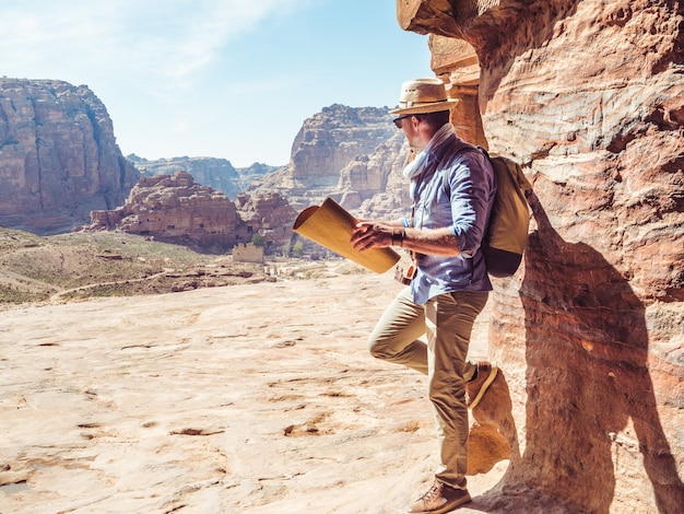 Handsome man, exploring the sights of of Petra