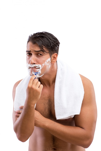 Handsome man shaving isolated on white background