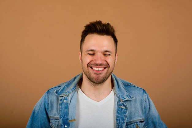 Handsome man standing and smiling isolated