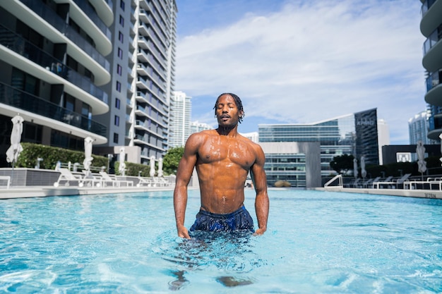 Handsome man in the swimming pool