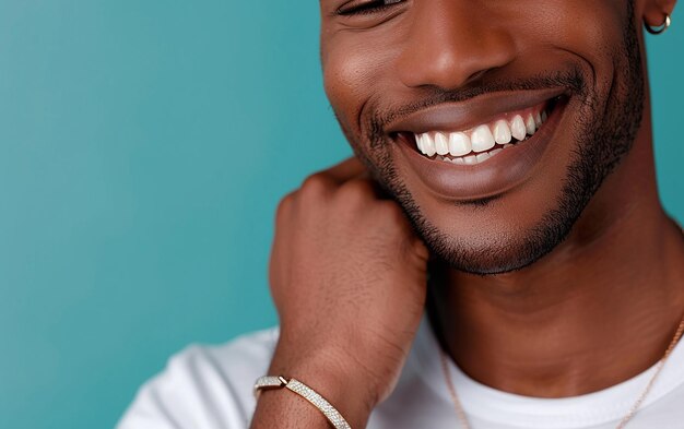 A Handsome Man in a White Shirt is Smiling