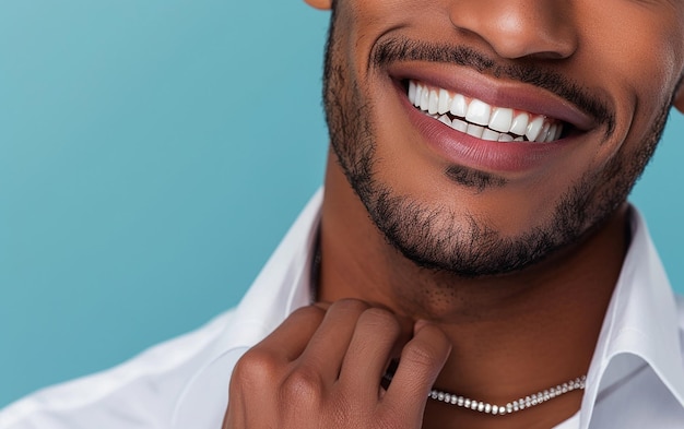 A Handsome Man in a White Shirt is Smiling