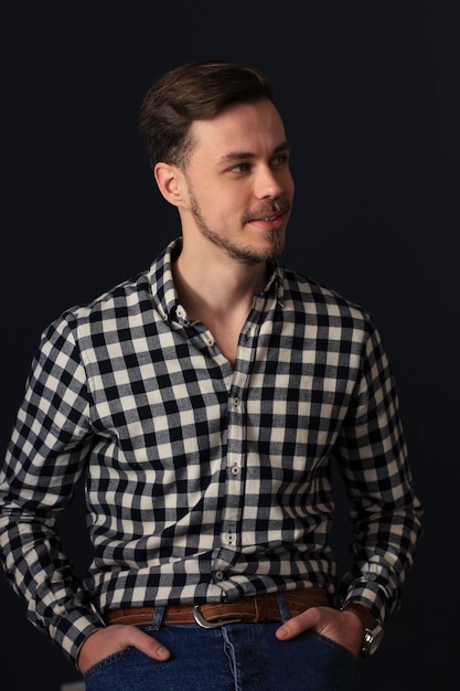 Handsome man with beard in shirt Studio shot